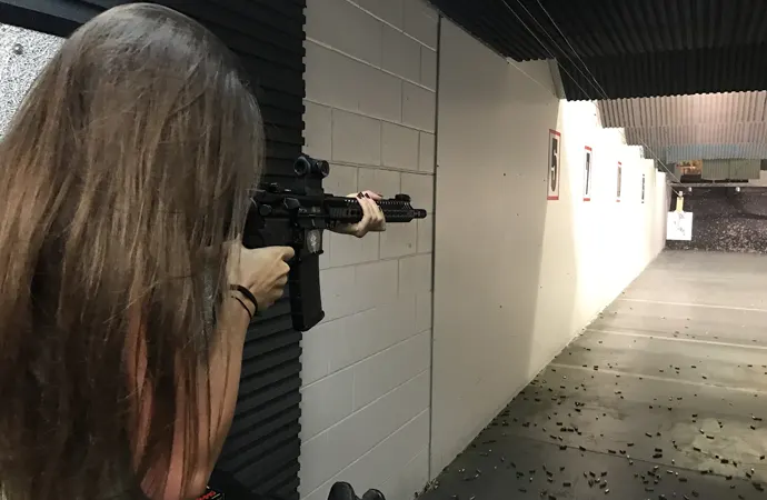 How can you reduce lead exposure while shooting a gun?