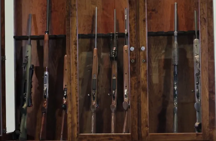 A cabinet is a better choice for displaying older guns, just as your China cabinet may be used to display your fine dishes.