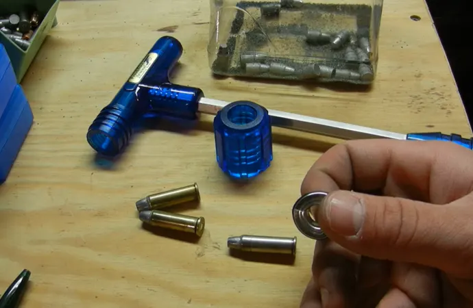 Take the cover and screw it back over to the hammer Take the cover and screw it back over to the hammer.