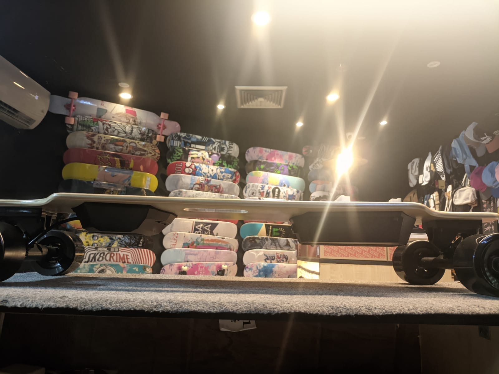 Onewheel VS Electric Skateboard: Side By Side Comparison four-wheeled electric skateboards are propelled by a motor in the trucks and have more wheels.