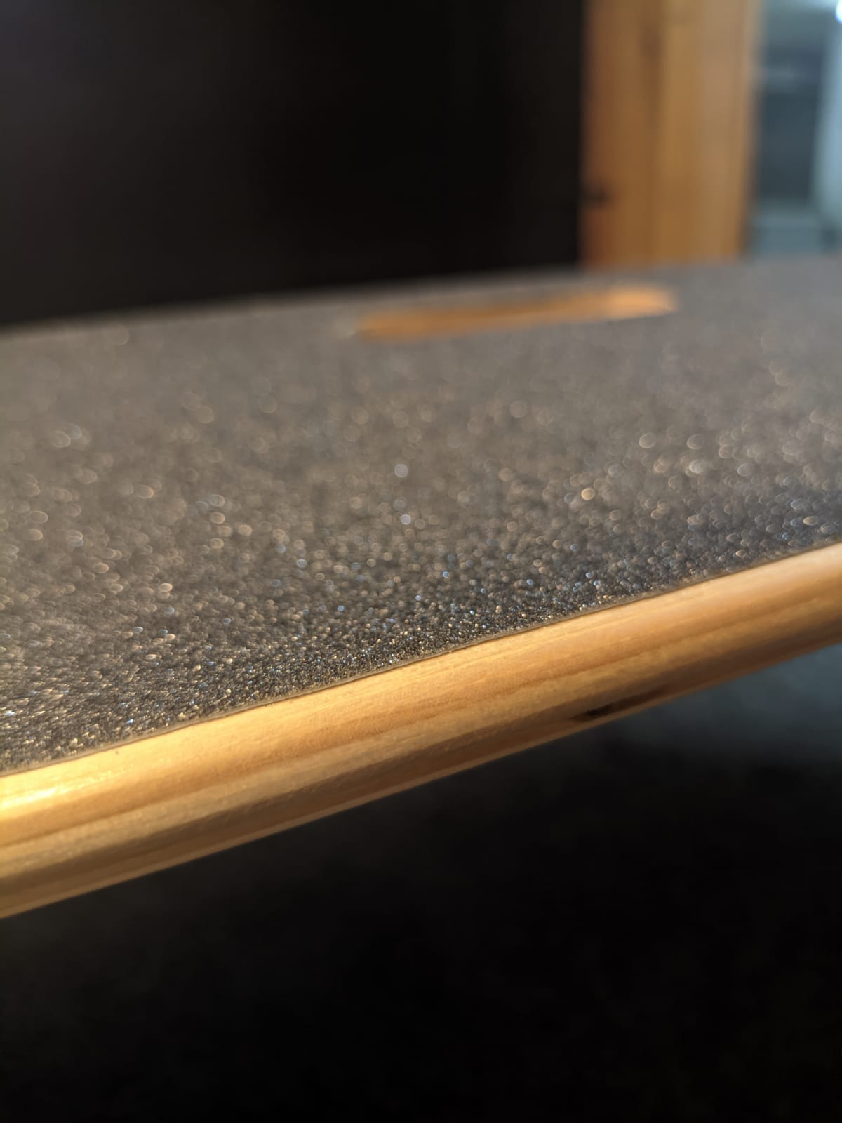 Anatomy of a Skateboard: Uncover the Surprising Secrets! Grip tape is a sandpaper-based sheet used to cover your deck. They are attached to the deck by adhesives.
