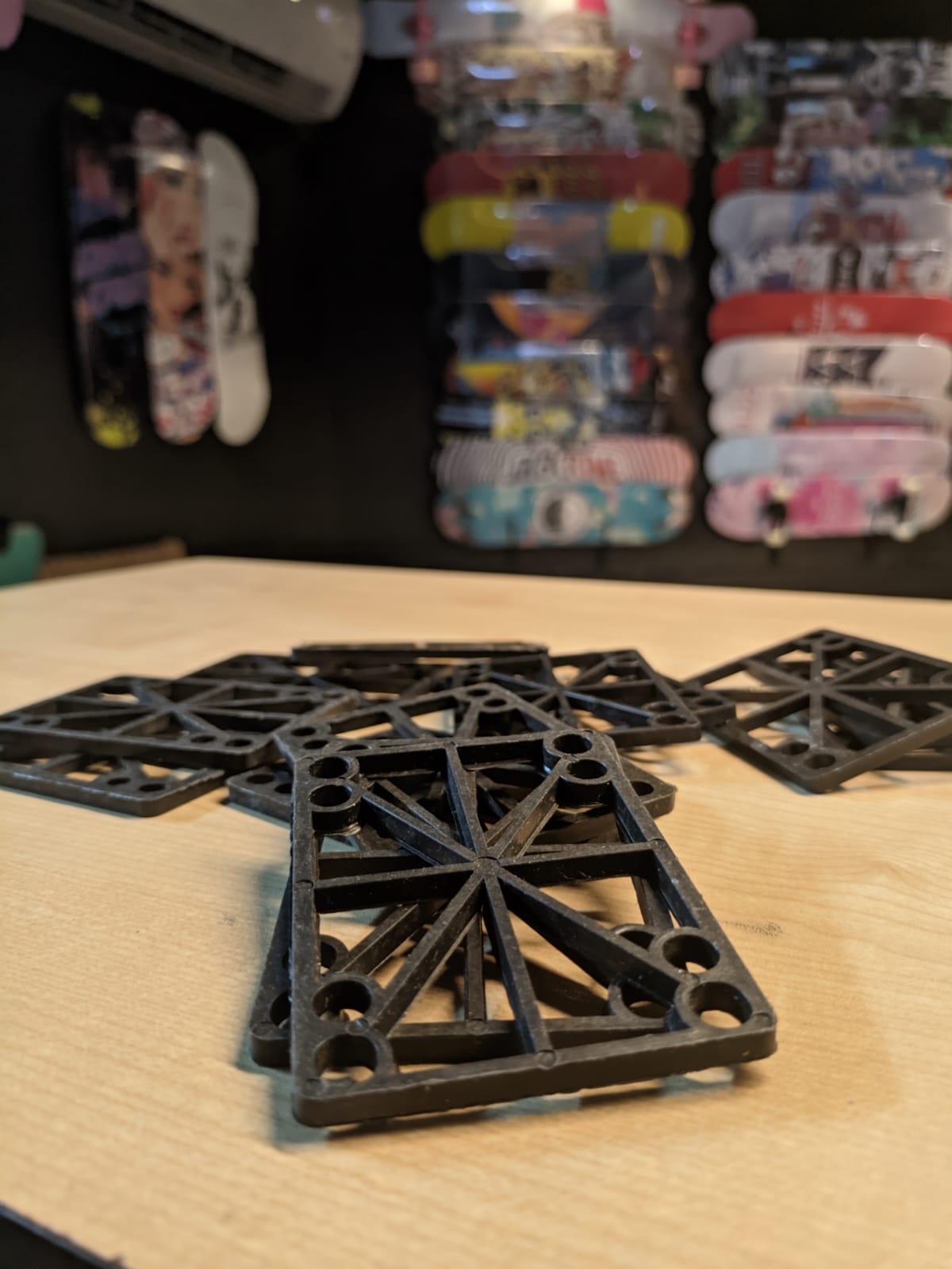 Anatomy of a Skateboard: Uncover the Surprising Secrets! The riser is a rough plastic pad that elevates the height of the skateboard and helps avoid wheel bite.