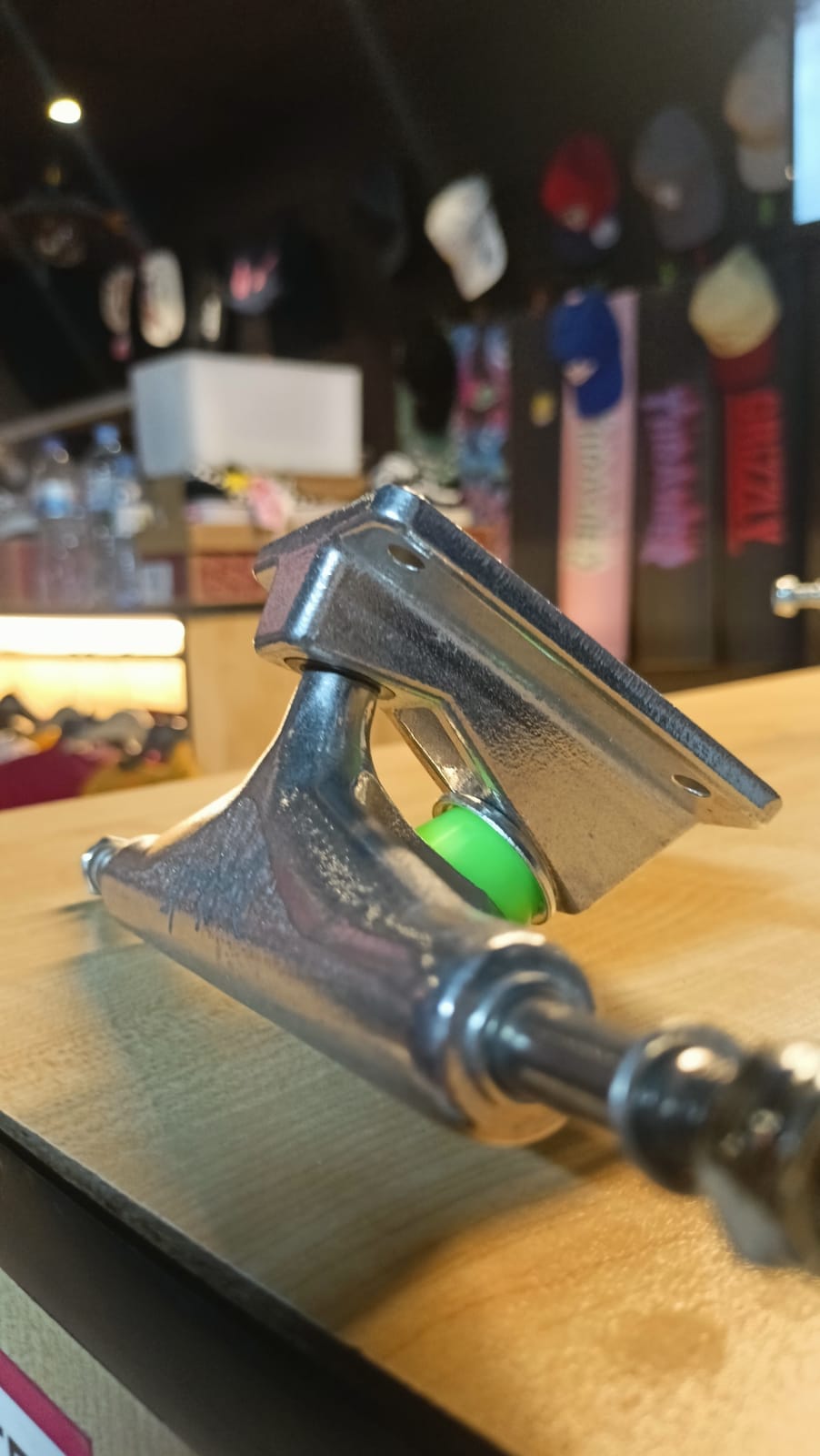 Anatomy of a Skateboard: Uncover the Surprising Secrets! The axle runs through the hanger and sprouts out on both sides.